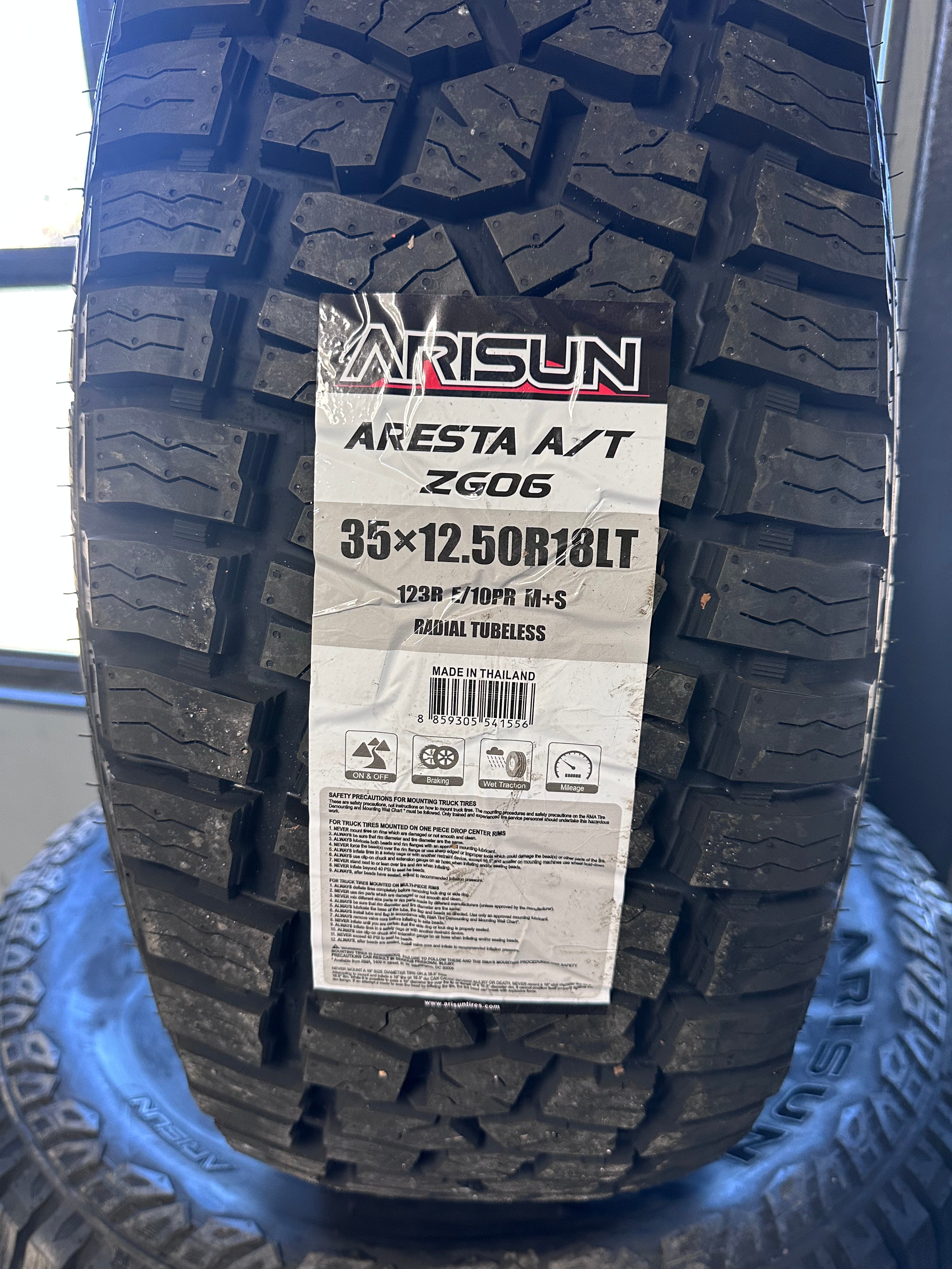 Set of FOUR Arisun Aresta A/T ZG06 35x12.50r18 Including Mount