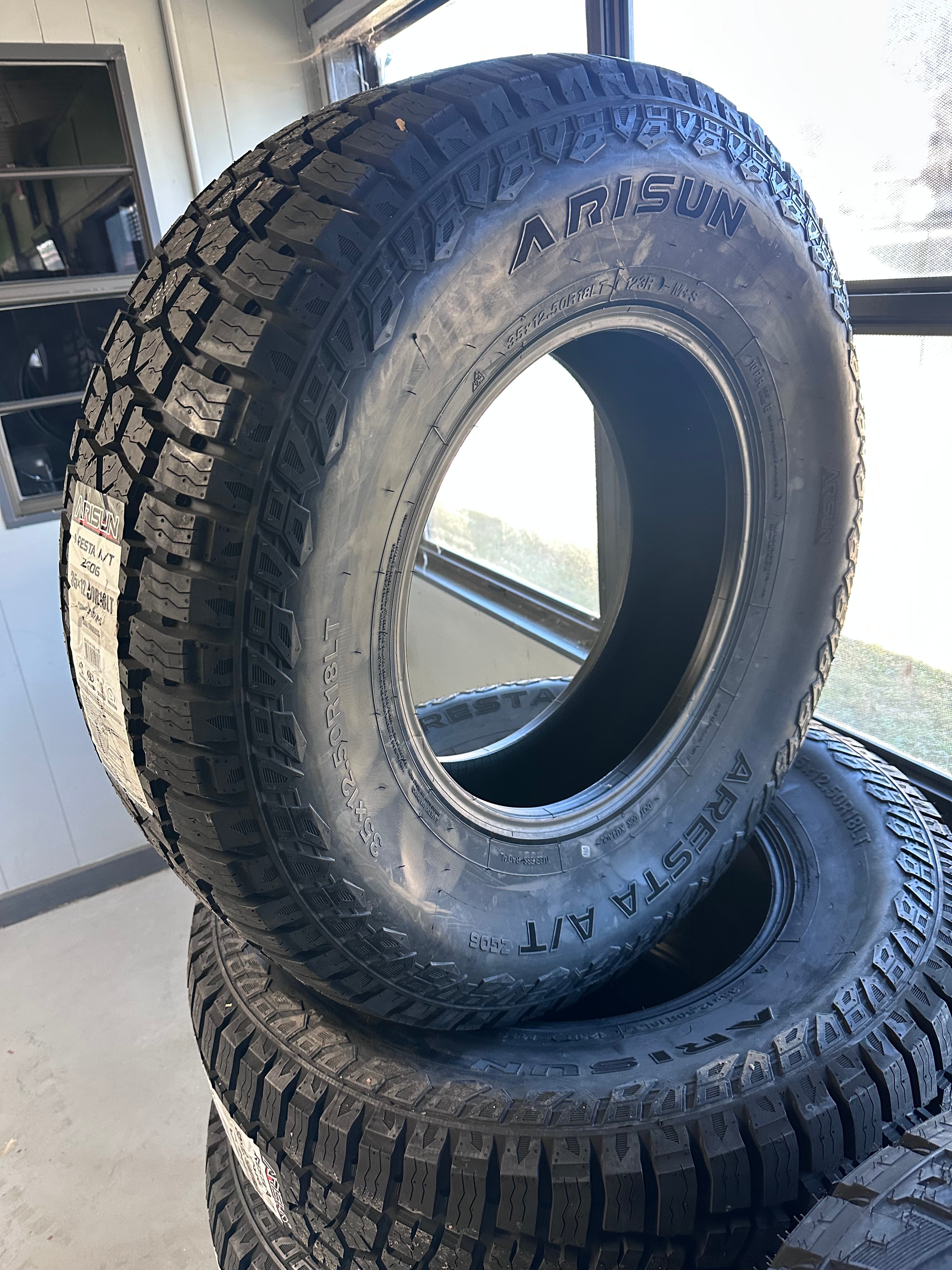 Set of FOUR Arisun Aresta A/T ZG06 35x12.50r18 Including Mount