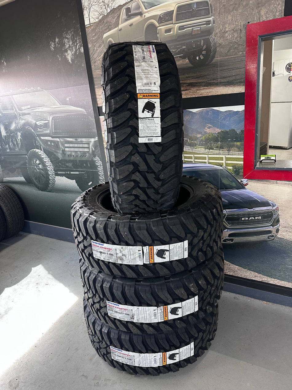 (SET of FOUR) Toyo Open Country MT 37x13.50r22 w/Installation